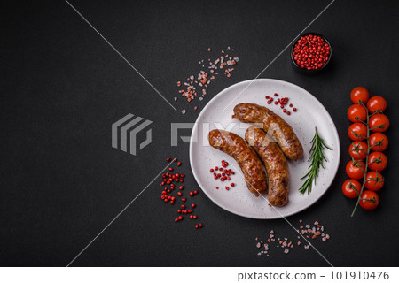 Delicious fried grilled sausages with salt, spices and herbs 101910476