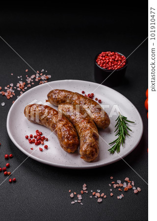 Delicious fried grilled sausages with salt, spices and herbs Delicious fried grilled sausages with salt, spices and herbs 101910477