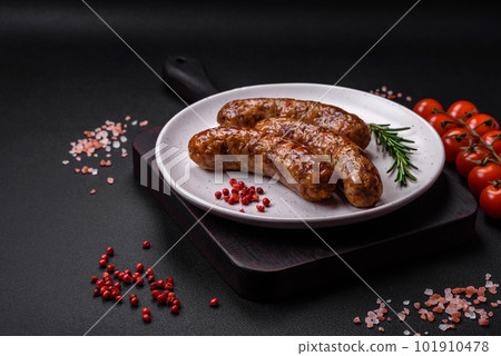 Delicious fried grilled sausages with salt, spices and herbs 101910478