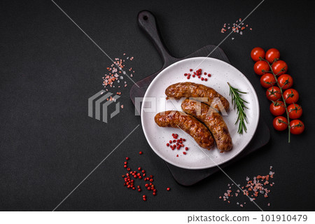 Delicious fried grilled sausages with salt, spices and herbs Delicious fried grilled sausages with salt, spices and herbs 101910479