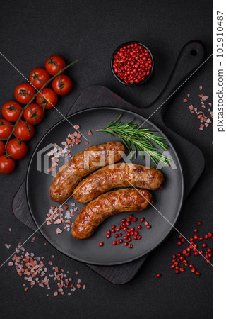 Delicious fried grilled sausages with salt, spices and herbs Delicious fried grilled sausages with salt, spices and herbs 101910487