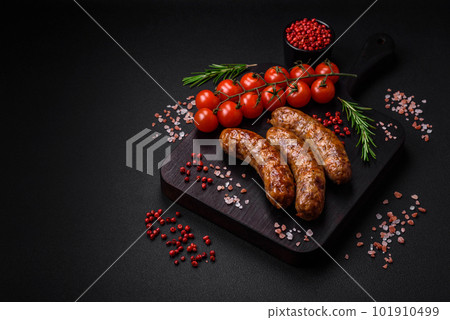 Delicious fried grilled sausages with salt, spices and herbs 101910499