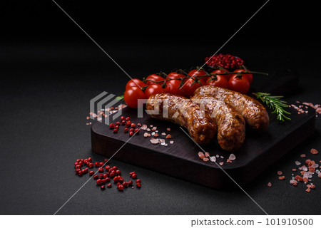 Delicious fried grilled sausages with salt, spices and herbs 101910500