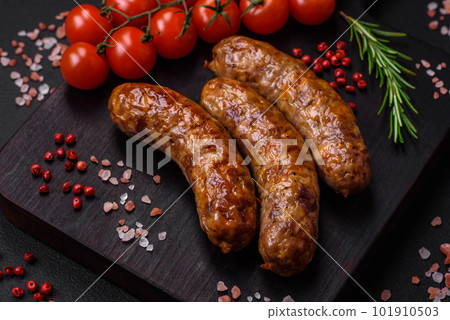 Delicious fried grilled sausages with salt, spices and herbs 101910503