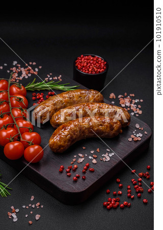 Delicious fried grilled sausages with salt, spices and herbs Delicious fried grilled sausages with salt, spices and herbs 101910510