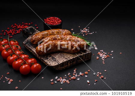 Delicious fried grilled sausages with salt, spices and herbs 101910519