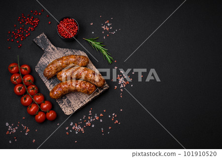 Delicious fried grilled sausages with salt, spices and herbs Delicious fried grilled sausages with salt, spices and herbs 101910520