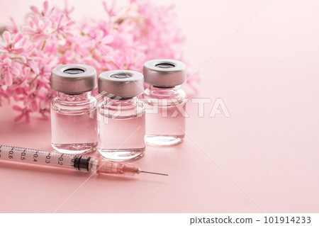 Vials and syringes on a pink background Beauty injection image material Vials and syringes on a pink background Beauty injection image material 101914233