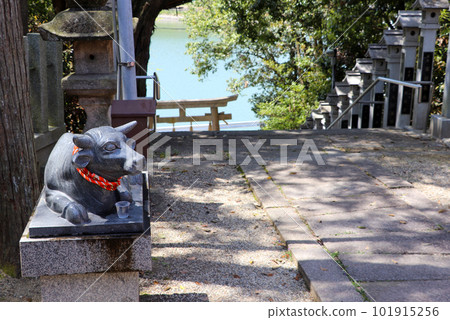 Statue of a cow placed in the precincts of a shrine Statue of a cow placed in the precincts of a shrine 101915256