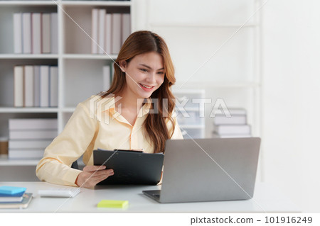 Accountant woman working on digital tablet and do document, tax, exchange, research, accounting and Financial advisor concept Accountant woman working on digital tablet and do document, tax, exchange, research, accounting and Financial advisor concept 101916249