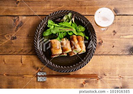 Zucchini, asparagus, sweet potato wrapped in pork belly Zucchini, asparagus, sweet potato wrapped in pork belly 101916385