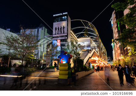 Miyashita Park, Tokyo's cityscape in front of Shibuya Station at night 101916696
