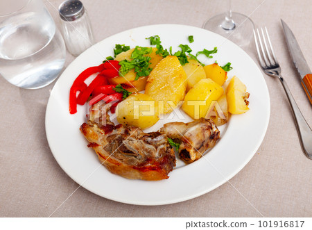 Side dish of baked lamb leg with potatoes and pepper Side dish of baked lamb leg with potatoes and pepper 101916817