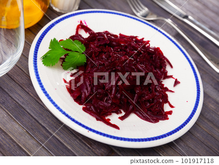 Portion of salad made of boiled and grated beetroot Portion of salad made of boiled and grated beetroot 101917118