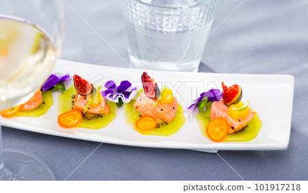 Plate of Marinated salmon canapes Plate of Marinated salmon canapes 101917218
