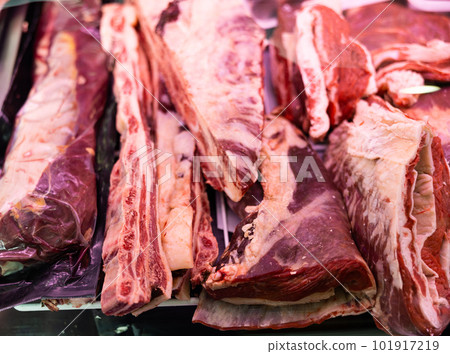 Chopped beef meat in metal trays displayed for sale Chopped beef meat in metal trays displayed for sale 101917219