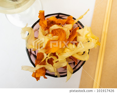 Delicious Yuca chips and Boniato Delicious Yuca chips and Boniato 101917426