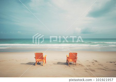 Two wooden chairs on the tropical beach with blue sky background, vintage tone Two wooden chairs on the tropical beach with blue sky background, vintage tone 101921957