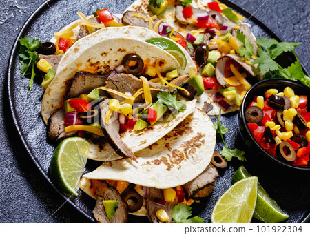 Beef Steak Tacos with veggies, avocado, corn Beef Steak Tacos with veggies, avocado, corn 101922304