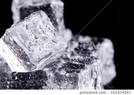 Three ice cubes on black background. 101924042