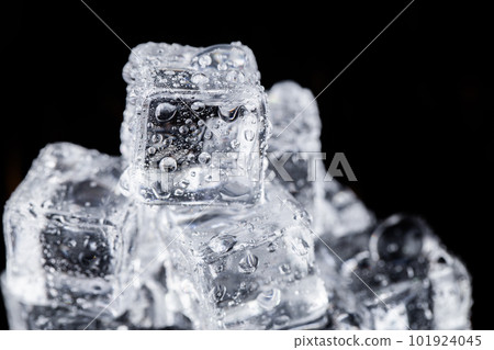 Three ice cubes on black background. Three ice cubes on black background. 101924045