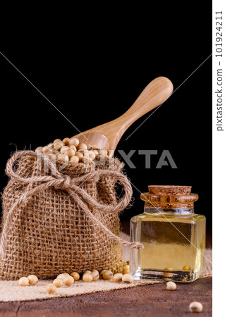 Soybean oil on a wooden background. rustic style 101924211