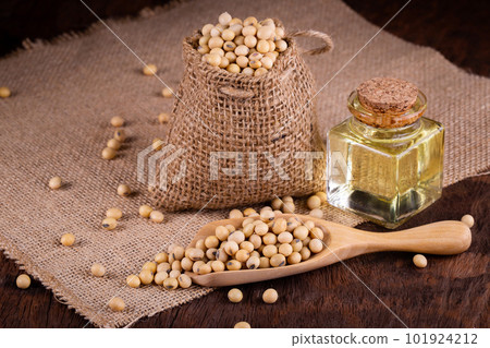Soybean oil on a wooden background. rustic style 101924212
