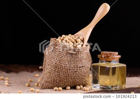 Soybean oil on a wooden background. rustic style 101924213
