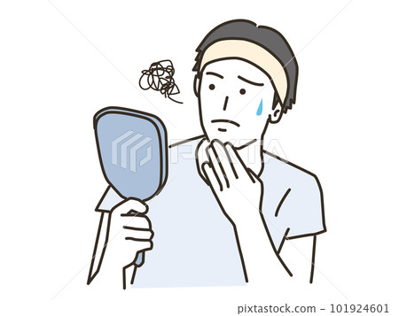 A man with a troubled face doing skin care while looking in the mirror 101924601