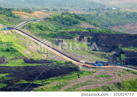 Part of a pit with big mining truck working Part of a pit with big mining truck working 101924777