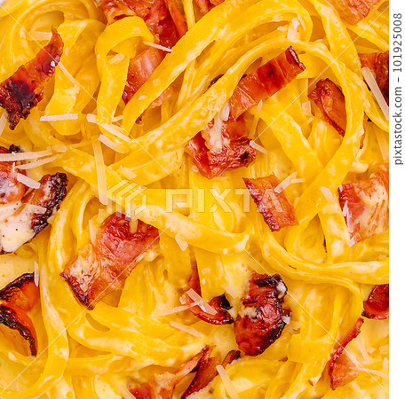 Pasta with bacon and basil close up Pasta with bacon and basil close up 101925008