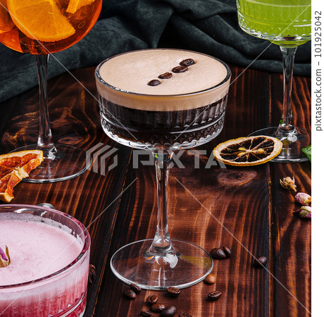 different colorful exotic alcoholic cocktails on wood different colorful exotic alcoholic cocktails on wood 101925042