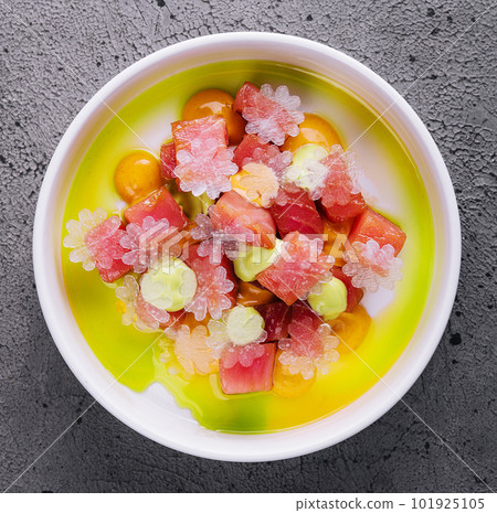Tartar of tuna with lime snow on top view Tartar of tuna with lime snow on top view 101925105
