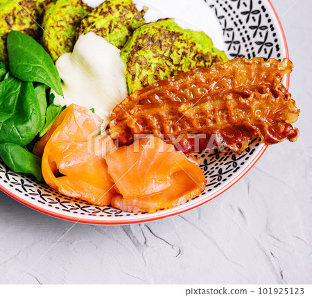 pumpkin pancakes with fried bacon and salmon 101925123