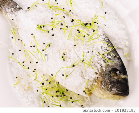 Fish baked in salt on plate Fish baked in salt on plate 101925193