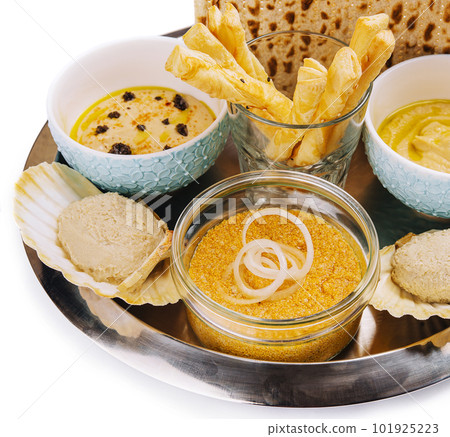 aperitif with hummus, mincemeat and pike caviar 101925223