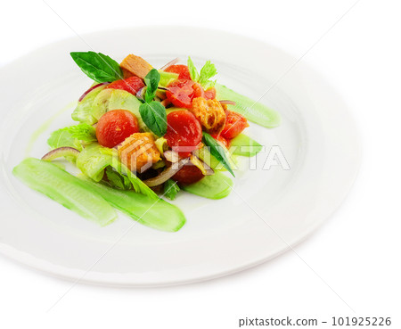 warm salad of stewed cherry tomatoes, cucumbers and croutons 101925226