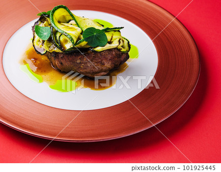 Barbecue dry aged wagyu fillet steak with grilled zucchini Barbecue dry aged wagyu fillet steak with grilled zucchini 101925445