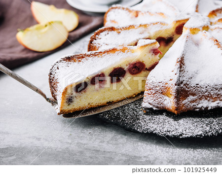 pie with cherries and powdered sugar pie with cherries and powdered sugar 101925449