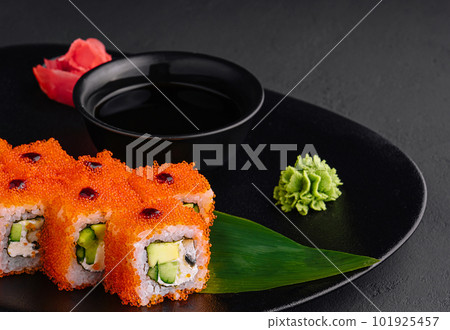 Close up Uramaki California on black plate Close up Uramaki California on black plate 101925457