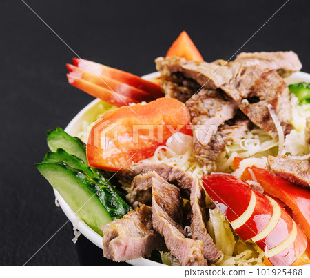 Warm salad with veal and vegetables Warm salad with veal and vegetables 101925488
