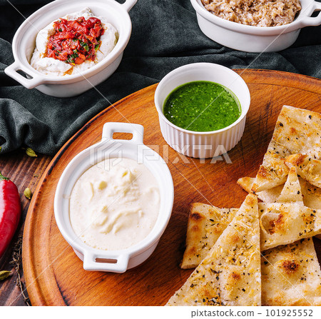 Italian focaccia bread with antipasti, top view Italian focaccia bread with antipasti, top view 101925552