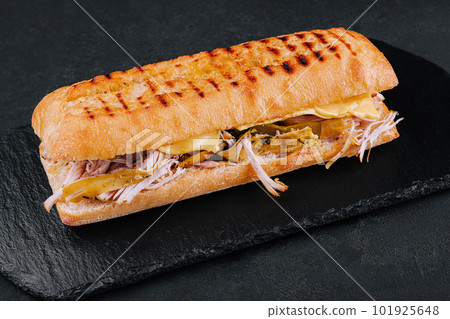 Big sandwich with chicken on stone board 101925648