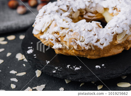 French traditional cake powdered sugar and almond petals French traditional cake powdered sugar and almond petals 101925662