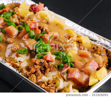 Lasagna with meat on black background Lasagna with meat on black background 101926091