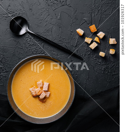 cheese soup with crackers top view 101926317