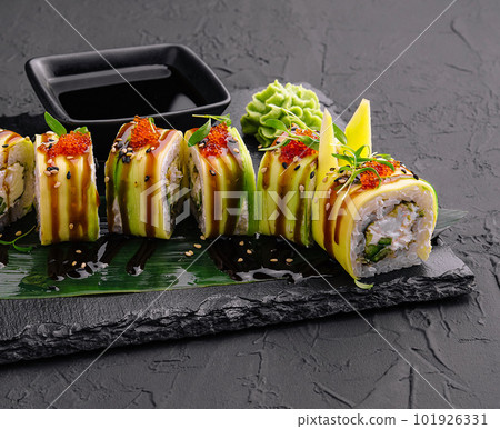 Sushi cheese rolls on black slate 101926331