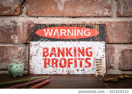 BANKING PROFITS Concept. Warning sign with text on wooden shel BANKING PROFITS Concept. Warning sign with text on wooden shel 101926332