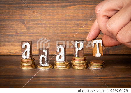 ADAPT. Text from wooden alphabet letters and change ADAPT. Text from wooden alphabet letters and change 101926479