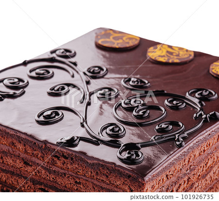 cake on white plate with topping chocolate cake on white plate with topping chocolate 101926735